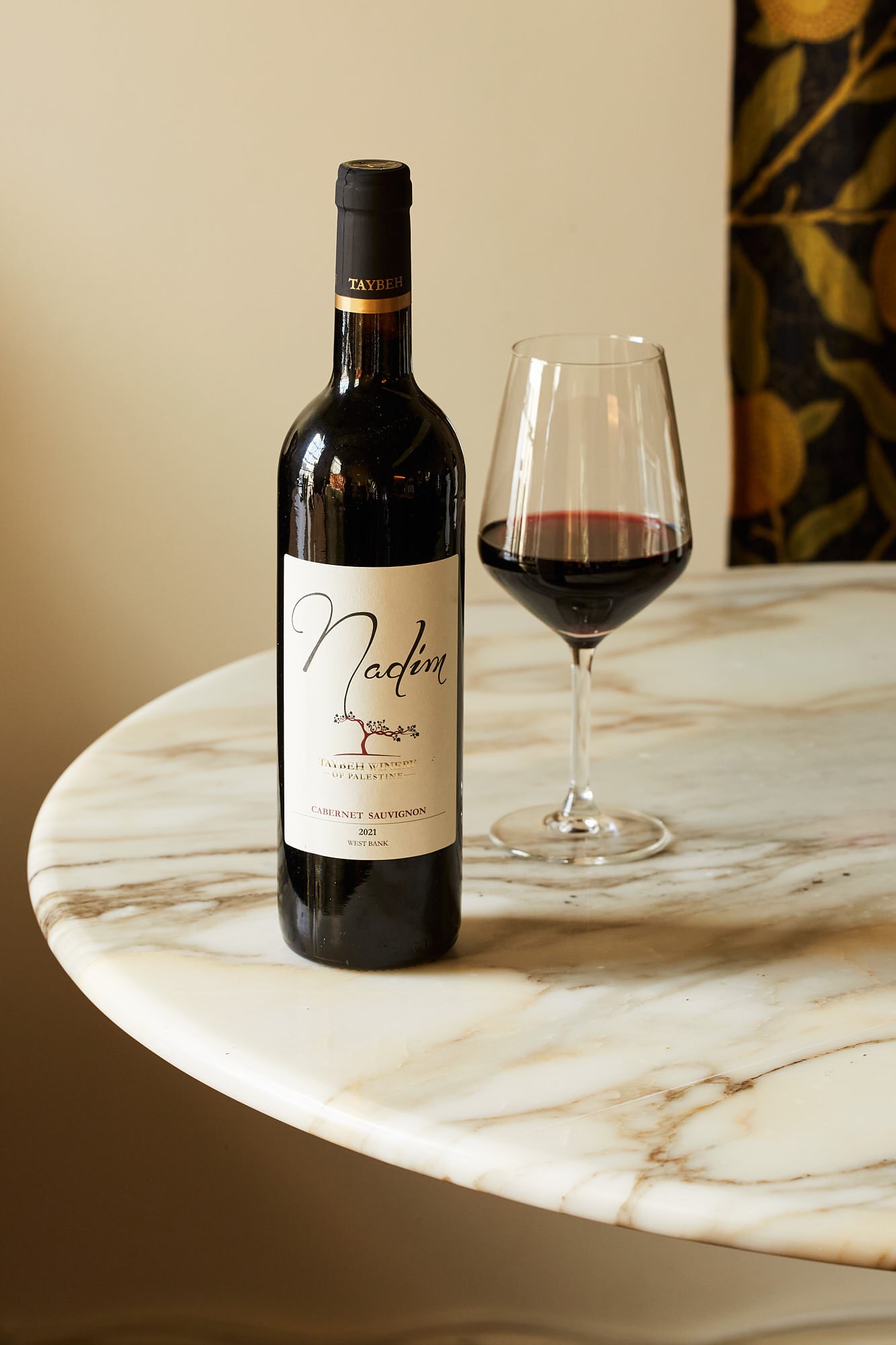 Taybeh Winery Cabernet Sauvignon Taybeh 2022 bottle and glass