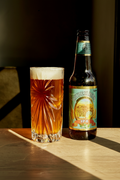 Taybeh IPA beer bottle and glass